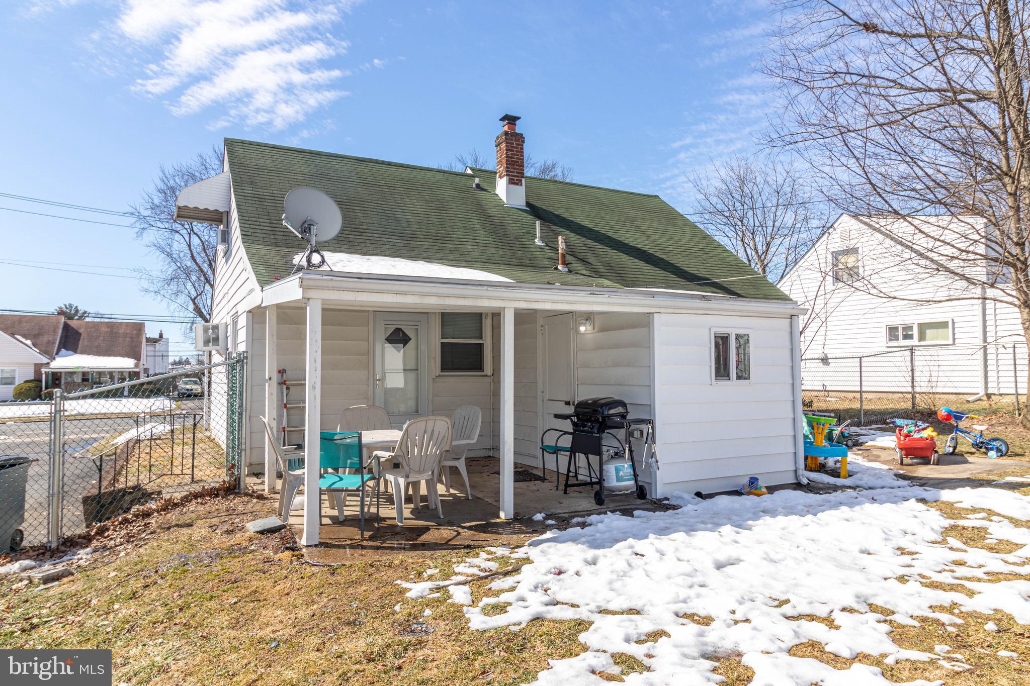 807 Tomlinson Road Philadelphia, PA 19116 - Photo 22 of 24 Back exterior. Addition has laundry w/heated floor