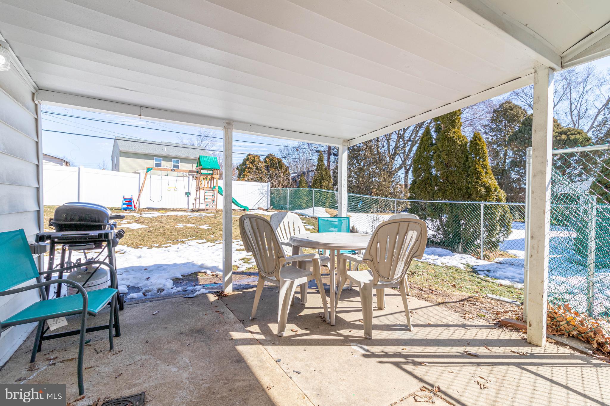 807 Tomlinson Road Philadelphia, PA 19116 - Photo 6 of 24 Back porch. Large fenced-in yard