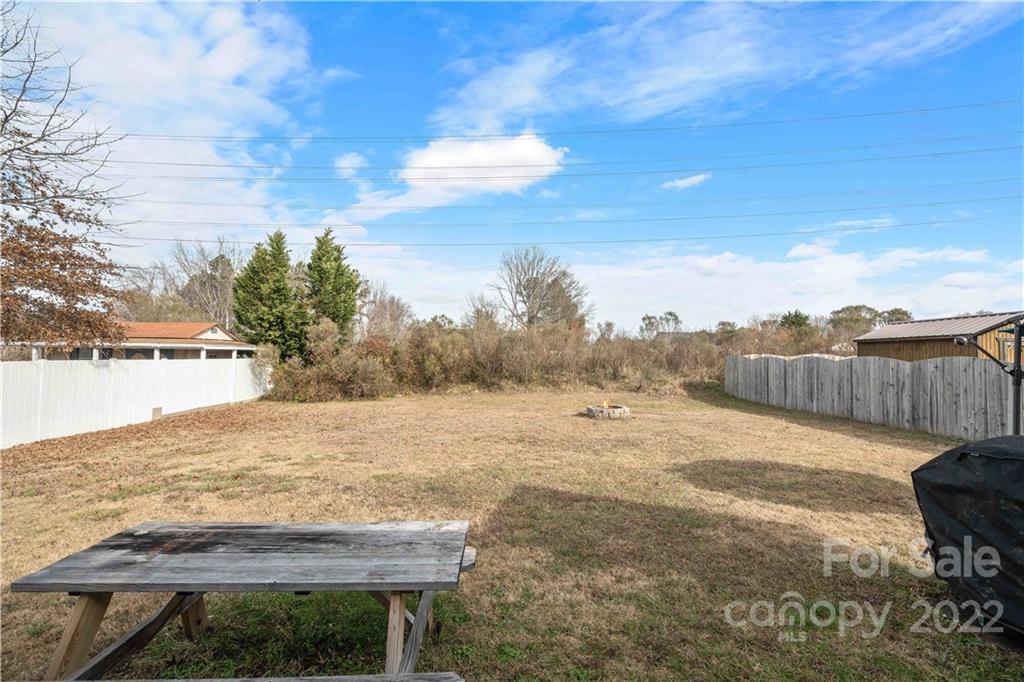 321 Dexter Place Monroe, NC 28110 - Photo 17 of 17 a view of a backyard of the house