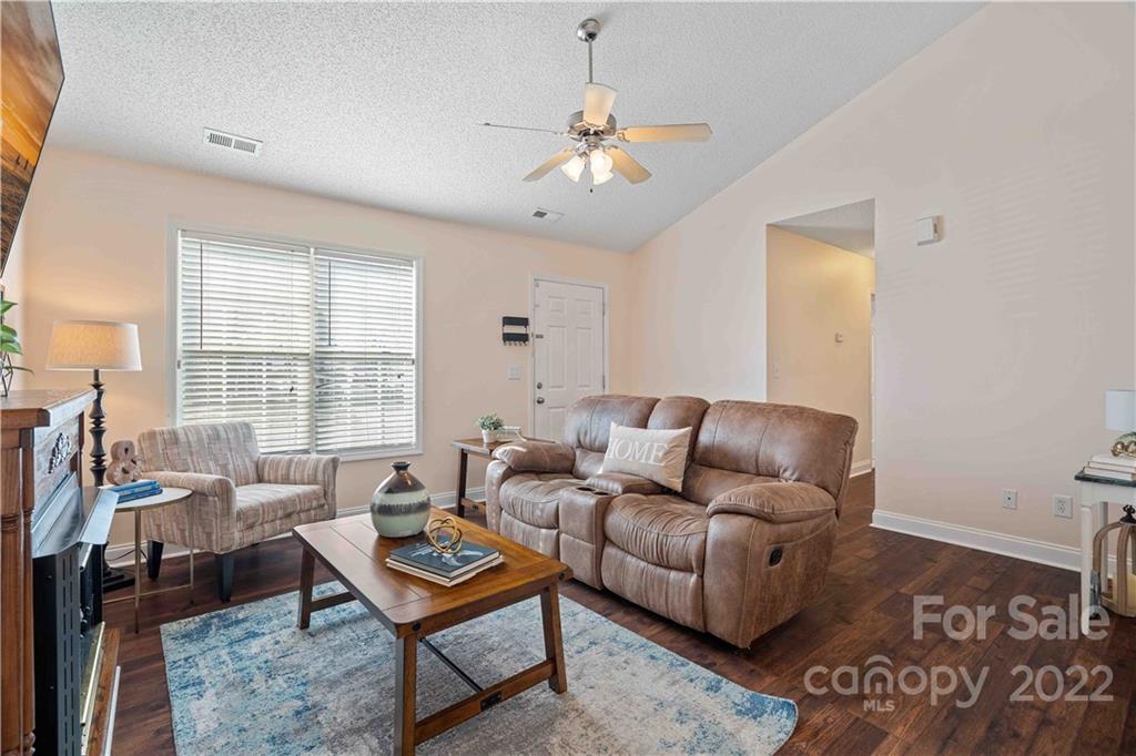 321 Dexter Place Monroe, NC 28110 - Photo 4 of 17 a living room with furniture and a large window