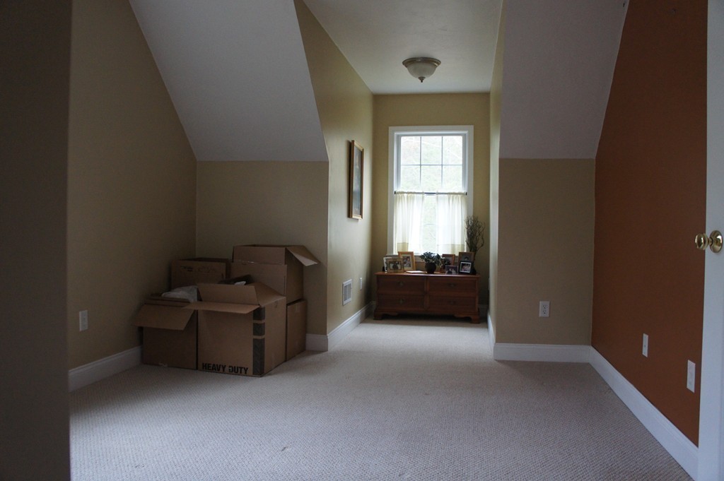 22 H Foote Road Charlton, MA 01507 - Photo 14 of 28 a living room with furniture and a window