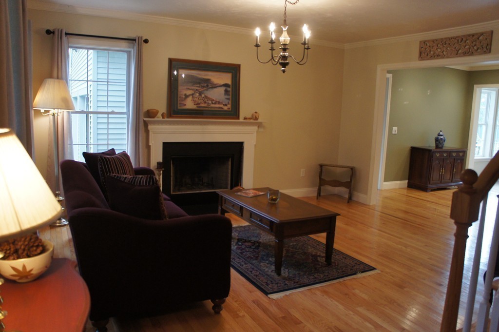 22 H Foote Road Charlton, MA 01507 - Photo 3 of 28 a living room with furniture and a fireplace