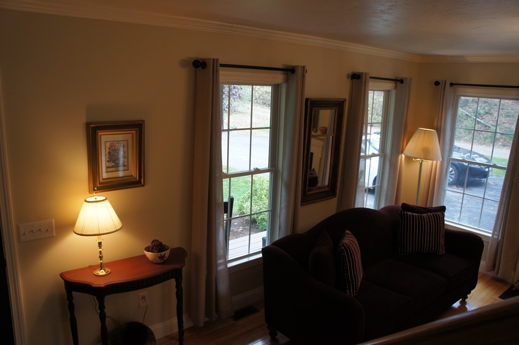 22 H Foote Road Charlton, MA 01507 - Photo 4 of 28 a living room with furniture and a lamp