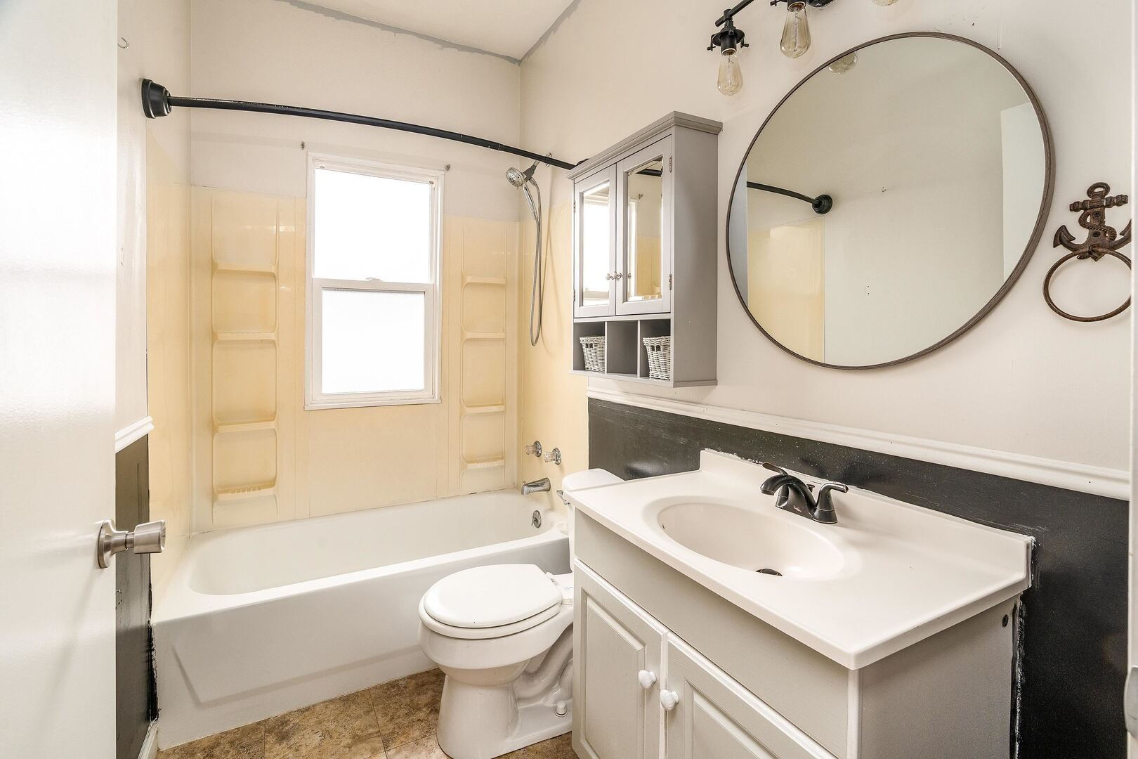 705 North Bridge Street Carbondale, IL 62901 - Photo 16 of 29 a bathroom with a sink a toilet and a mirror