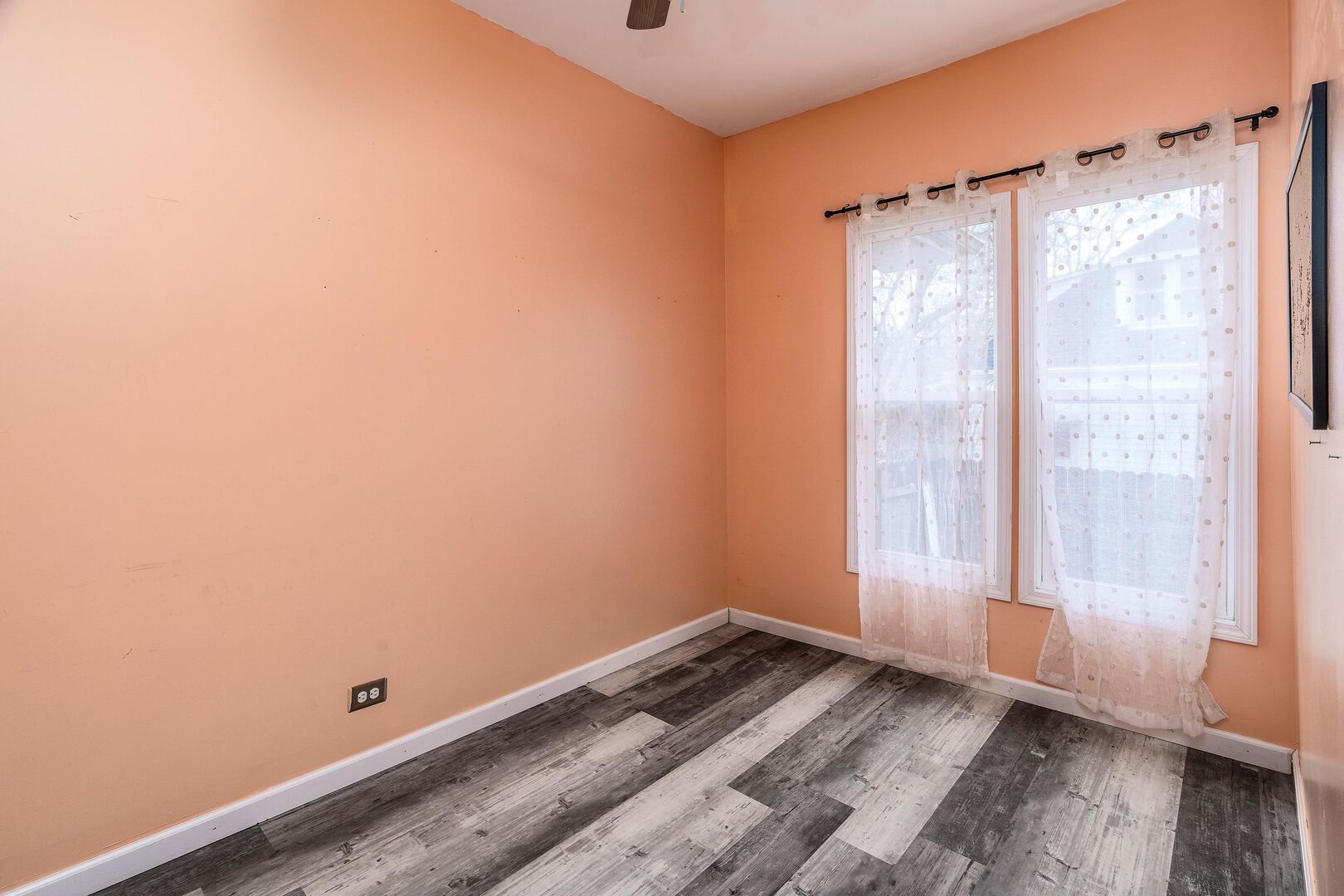 705 North Bridge Street Carbondale, IL 62901 - Photo 17 of 29 a view of a room with wooden floor and windows
