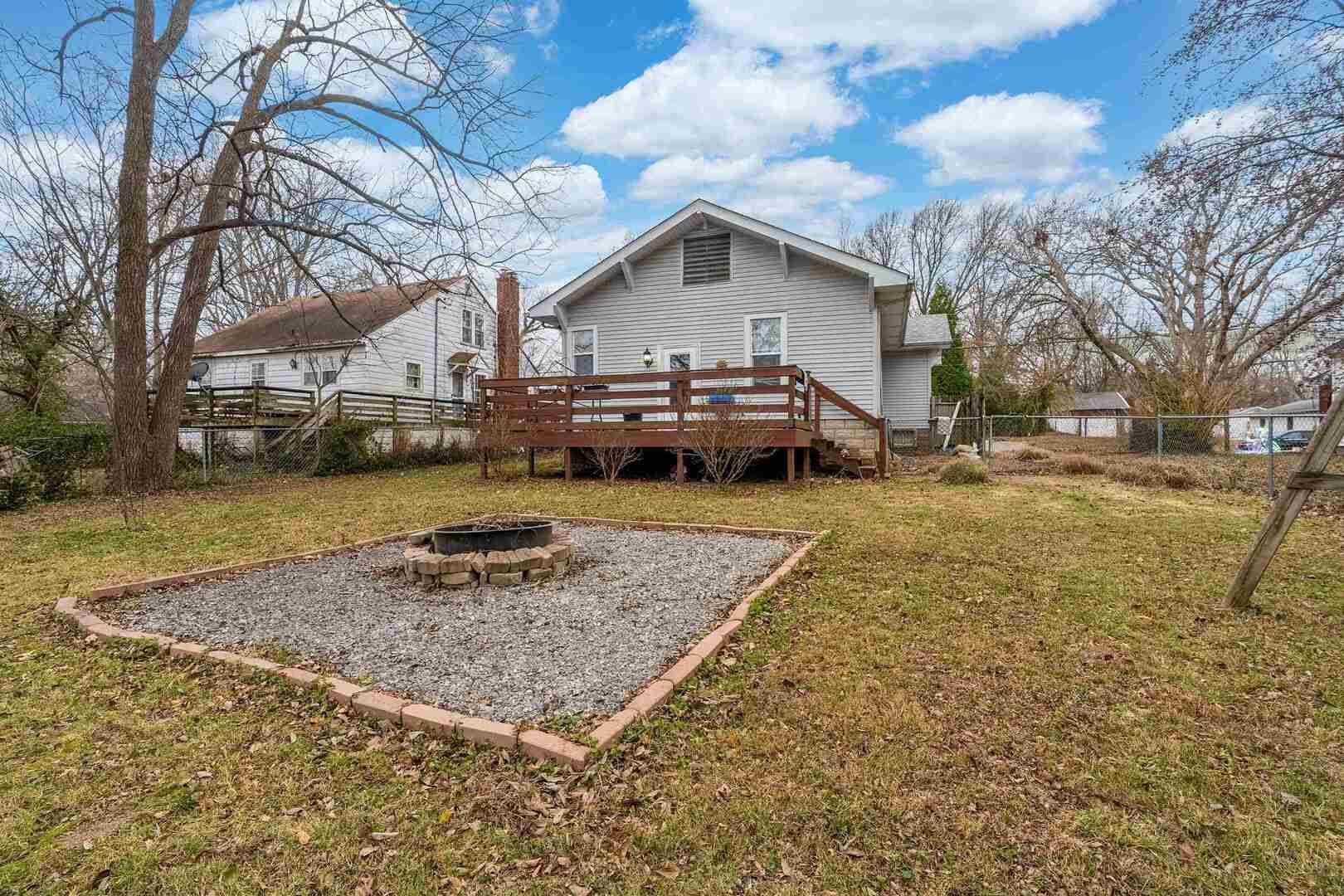 705 North Bridge Street Carbondale, IL 62901 - Photo 24 of 29 a view of a house with a yard covered in snow