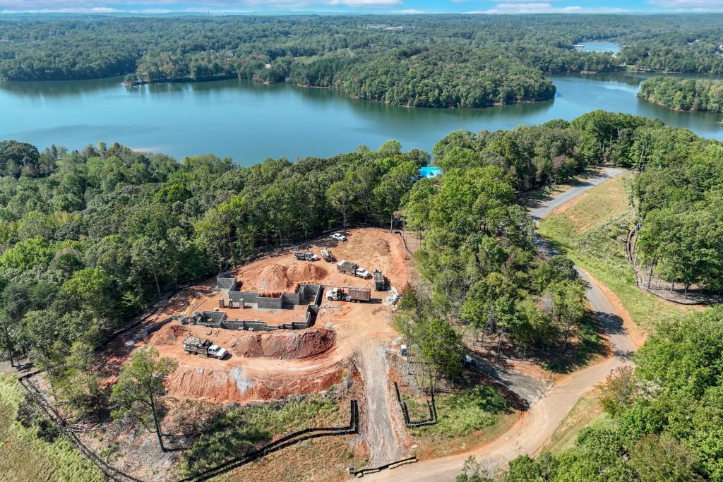 4564 Shirley Road Gainesville, GA 30506 - Photo 16 of 22 an aerial view of a house with a yard and lake view