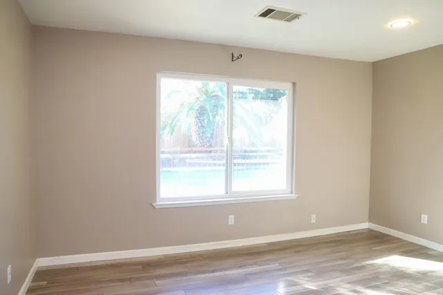 a bathroom with a sink and vanity