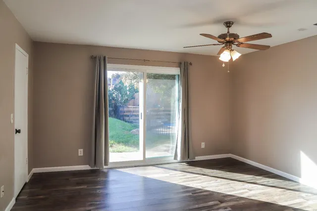 a bathroom with a sink a mirror and a window
