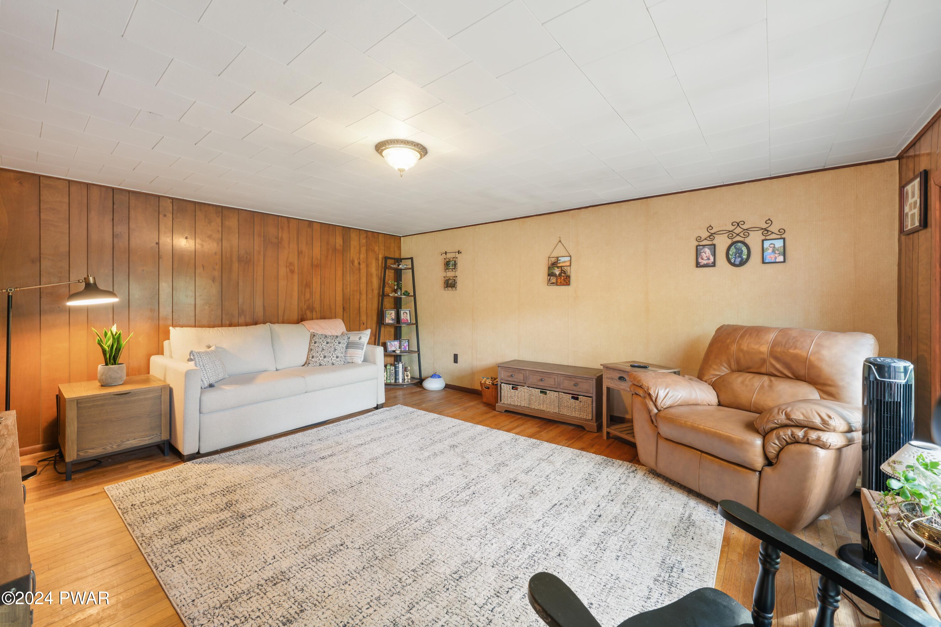 130 Beech Road Dingmans Ferry, PA 18328 - Photo 23 of 31 a living room with furniture