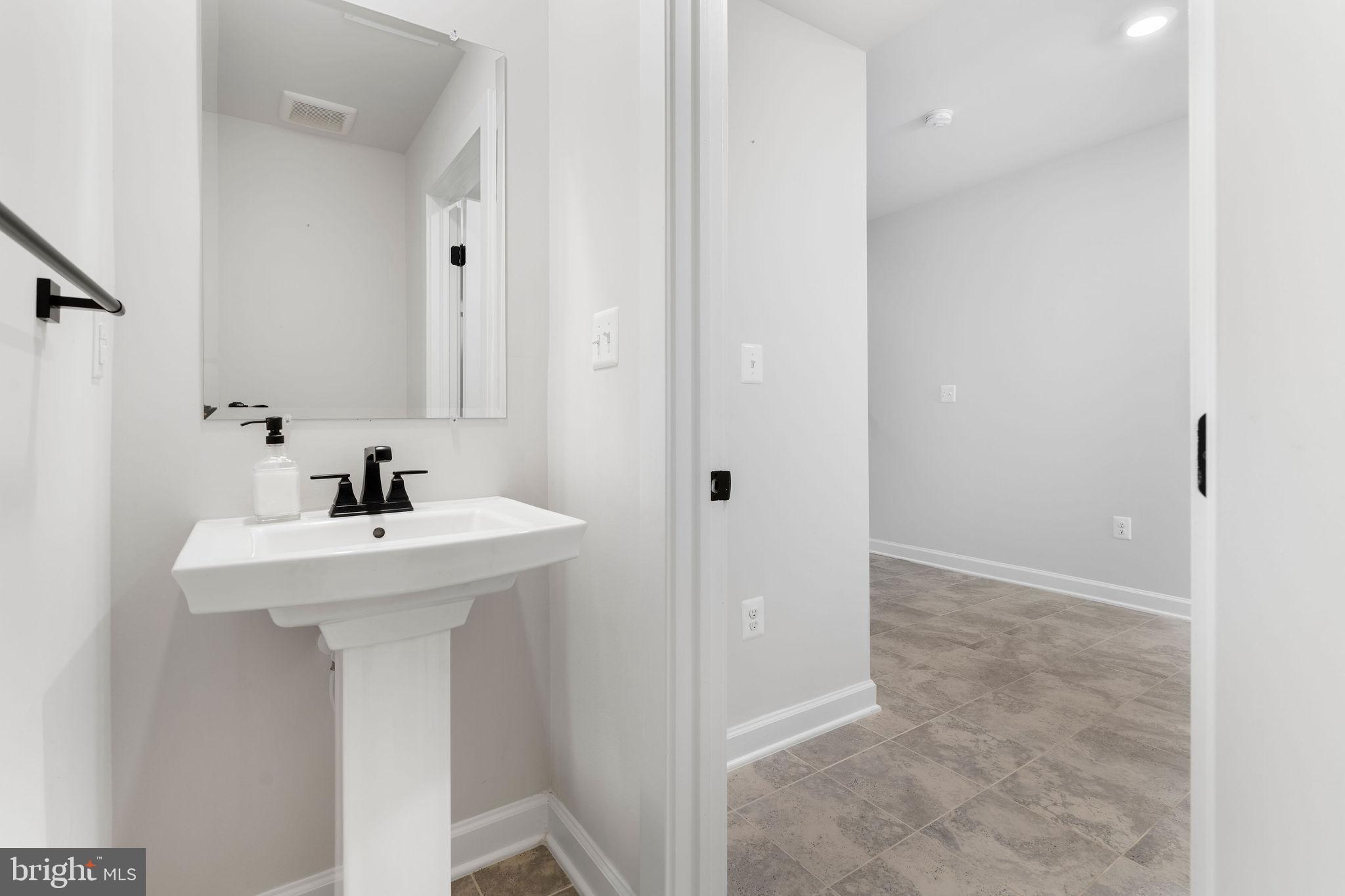 7217 Mainstream Way Columbia, MD 21044 - Photo 14 of 47 Entry Level Half Bath