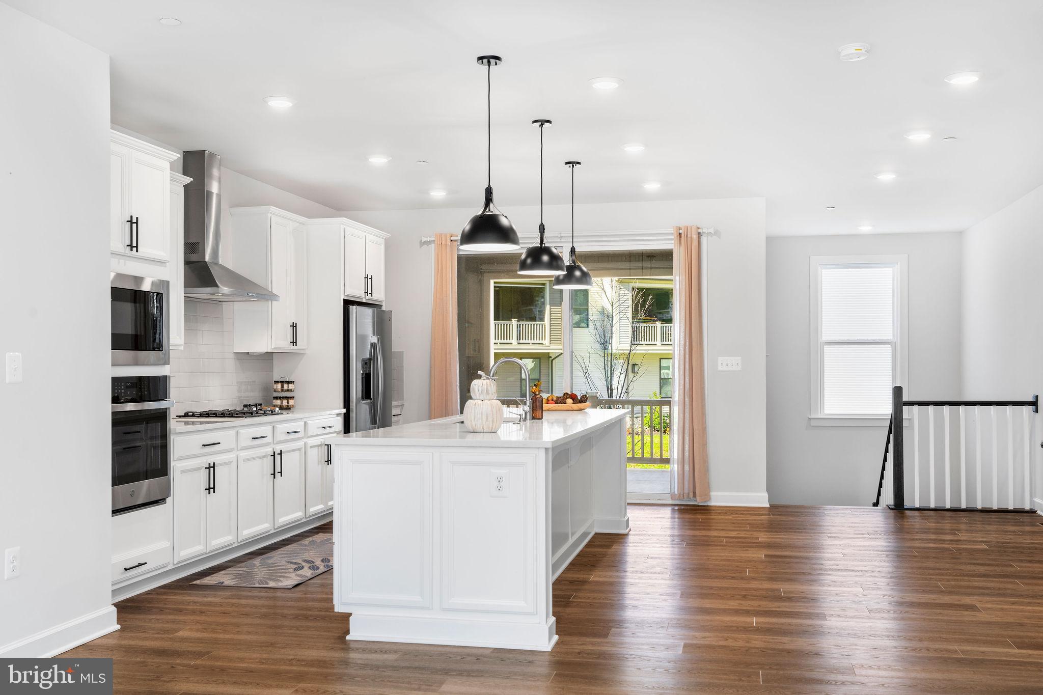 7217 Mainstream Way Columbia, MD 21044 - Photo 18 of 47 Gourmet Kitchen Leading to Spacious Patio
