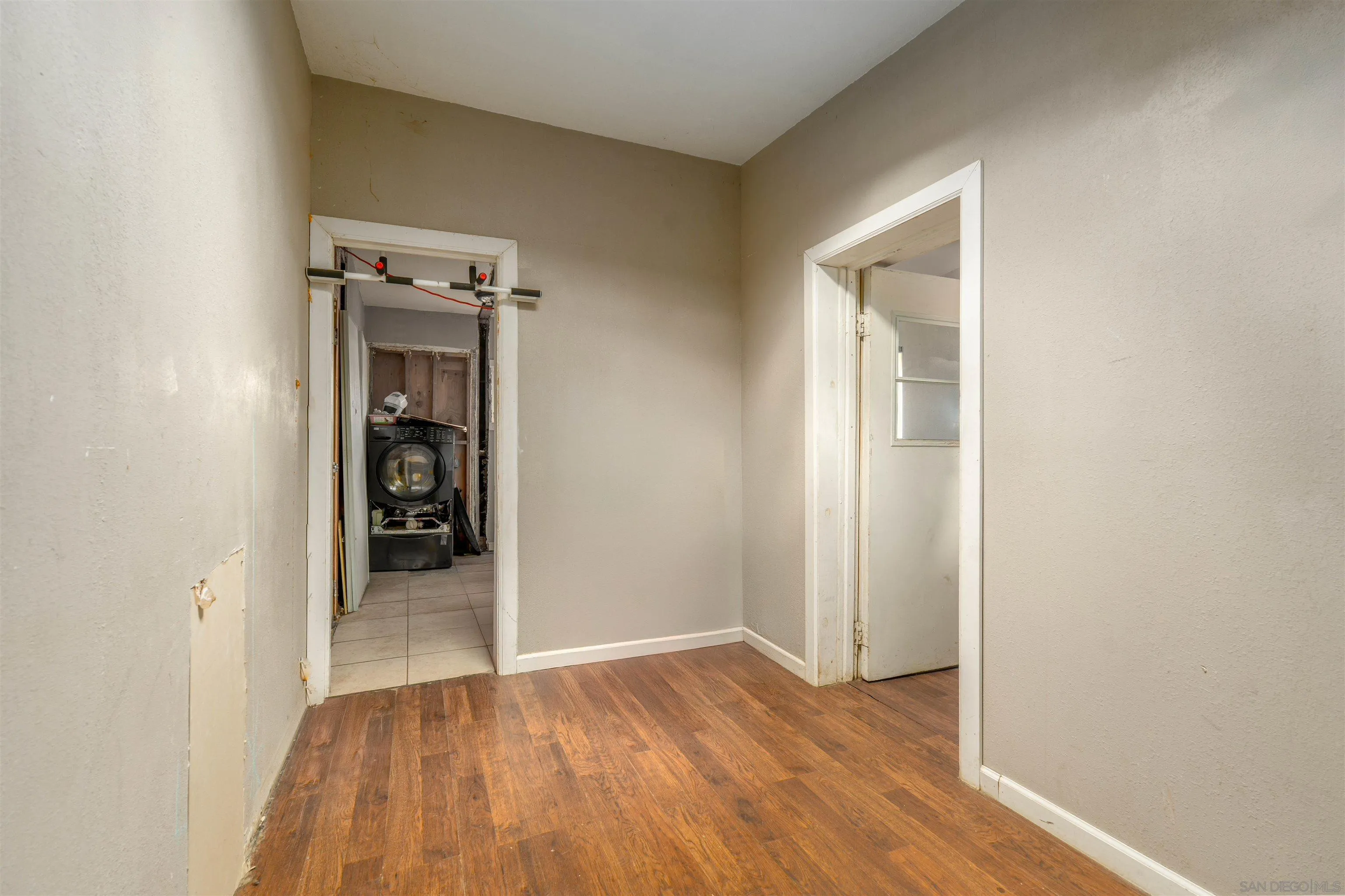 28587 Goetz Road Canyon Lake, CA 92587 - Photo 14 of 24 a view of a hallway with wooden floor