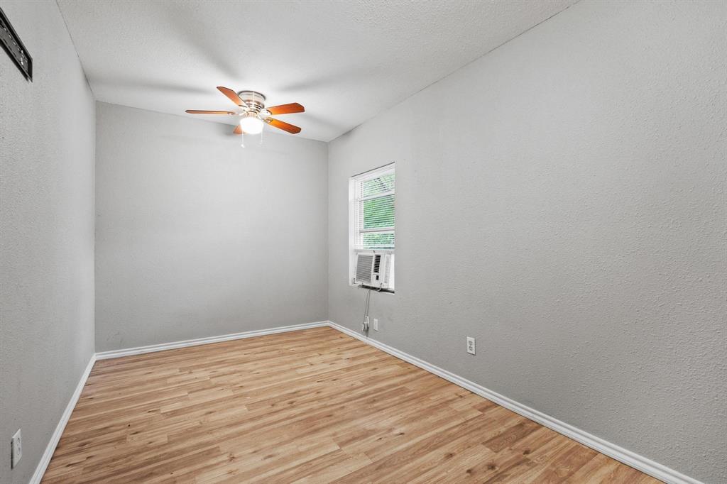 701 West Hull Street, Unit 1012 Denison, TX 75020 - Photo 17 of 22 a view of empty room with wooden floor