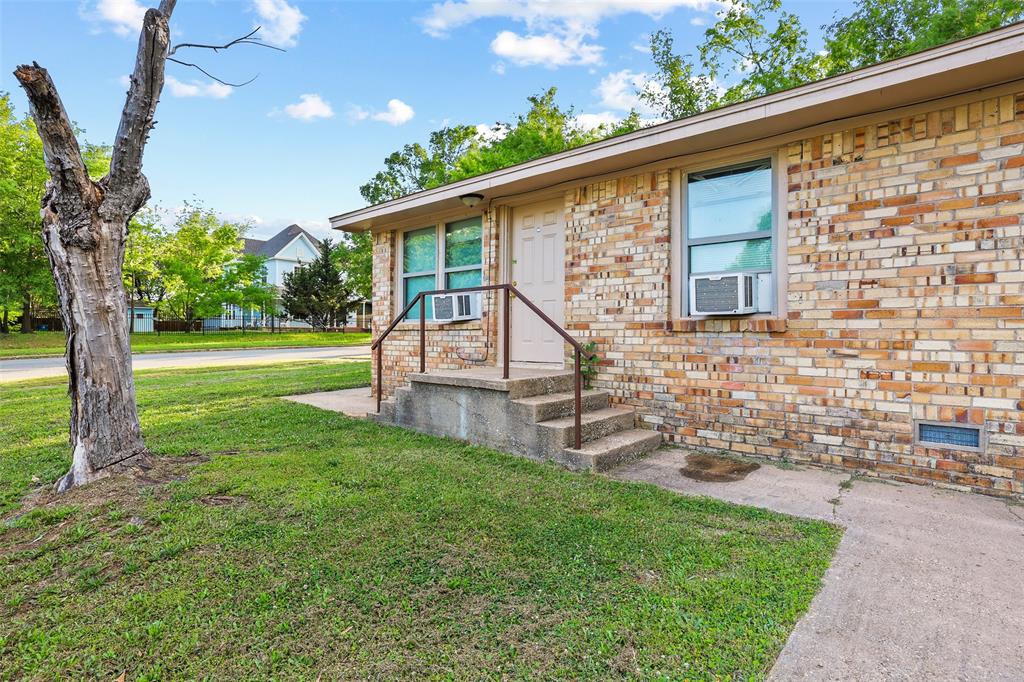 701 West Hull Street, Unit 1012 Denison, TX 75020 - Photo 2 of 22 a view of a house with a yard