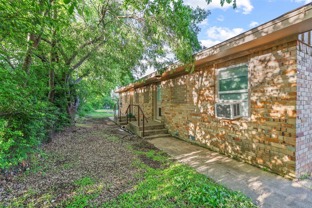 701 West Hull Street, Unit 1012 Denison, TX 75020 - Photo 22 of 22 a backyard of a house with lots of green space