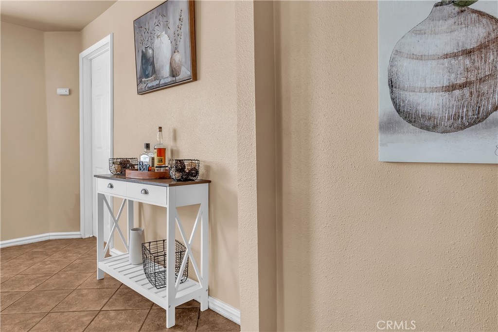 1414 West Shorb Street Alhambra, CA 91803 - Photo 14 of 33 a dining room with furniture and a mirror
