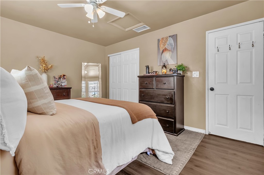 1414 West Shorb Street Alhambra, CA 91803 - Photo 16 of 33 a bedroom with a bed and a chandelier