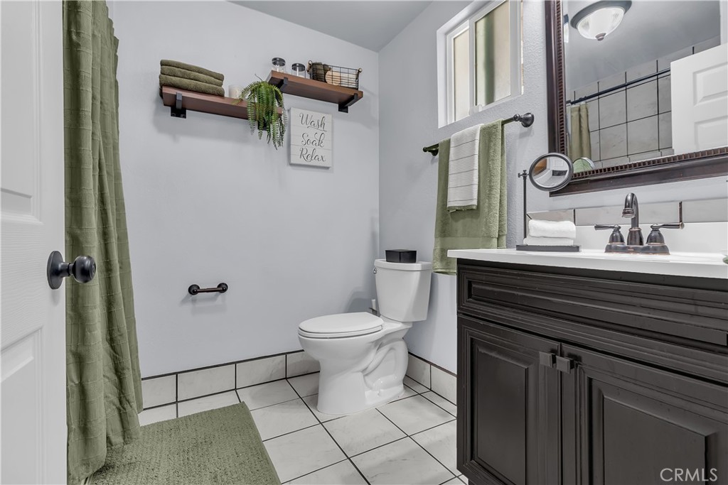 1414 West Shorb Street Alhambra, CA 91803 - Photo 21 of 33 a bathroom with a sink toilet and shower