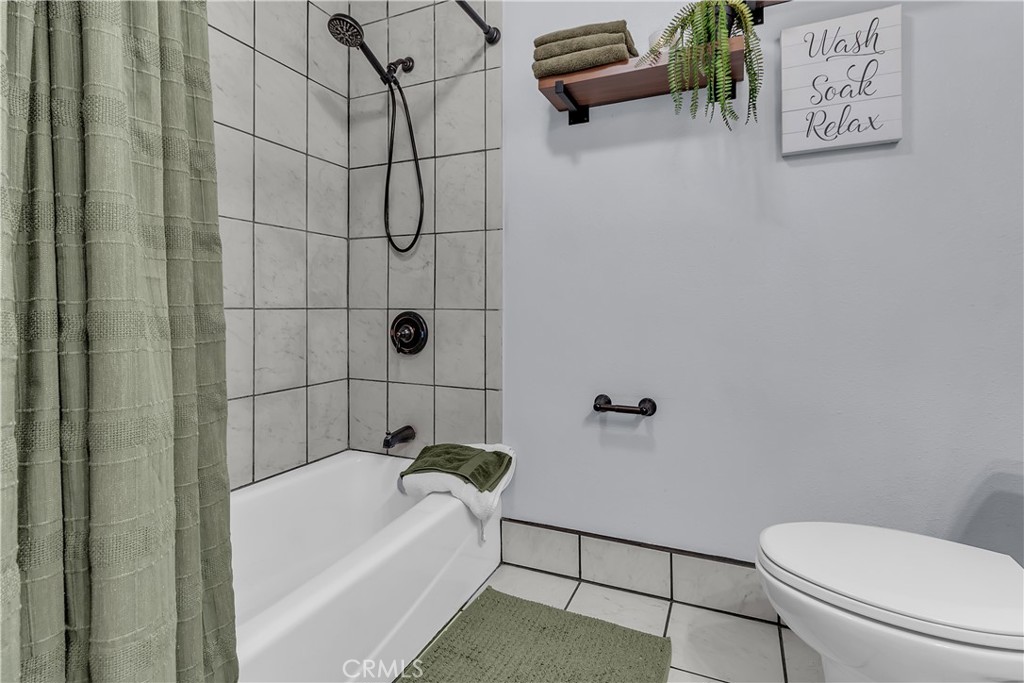 1414 West Shorb Street Alhambra, CA 91803 - Photo 22 of 33 a bathroom with a toilet and shower