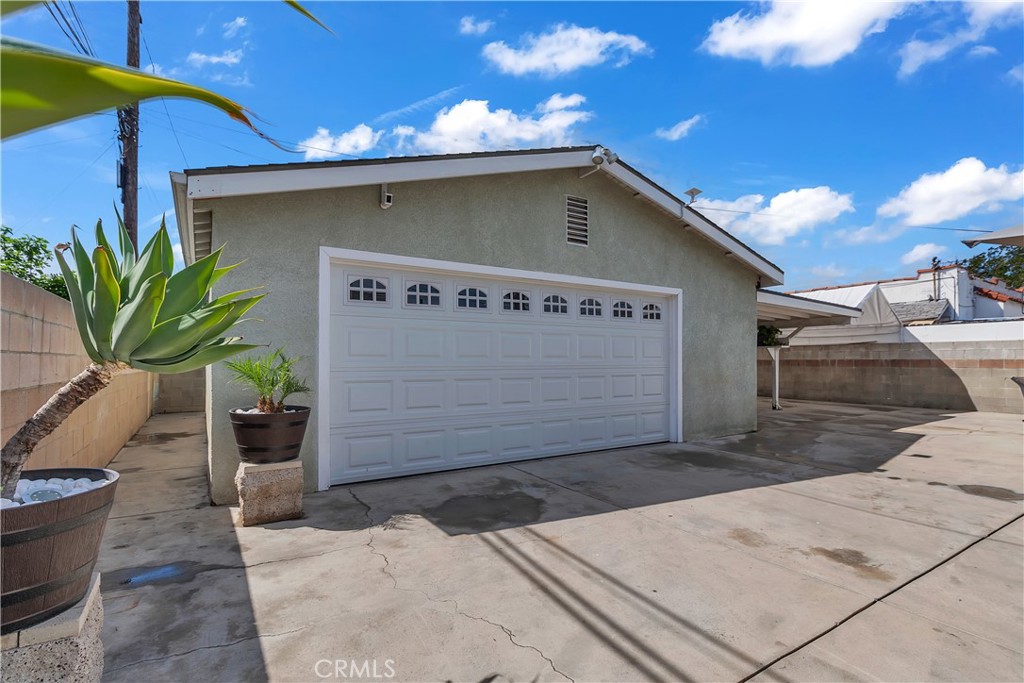 1414 West Shorb Street Alhambra, CA 91803 - Photo 24 of 33 a front view of a house with a potted plant