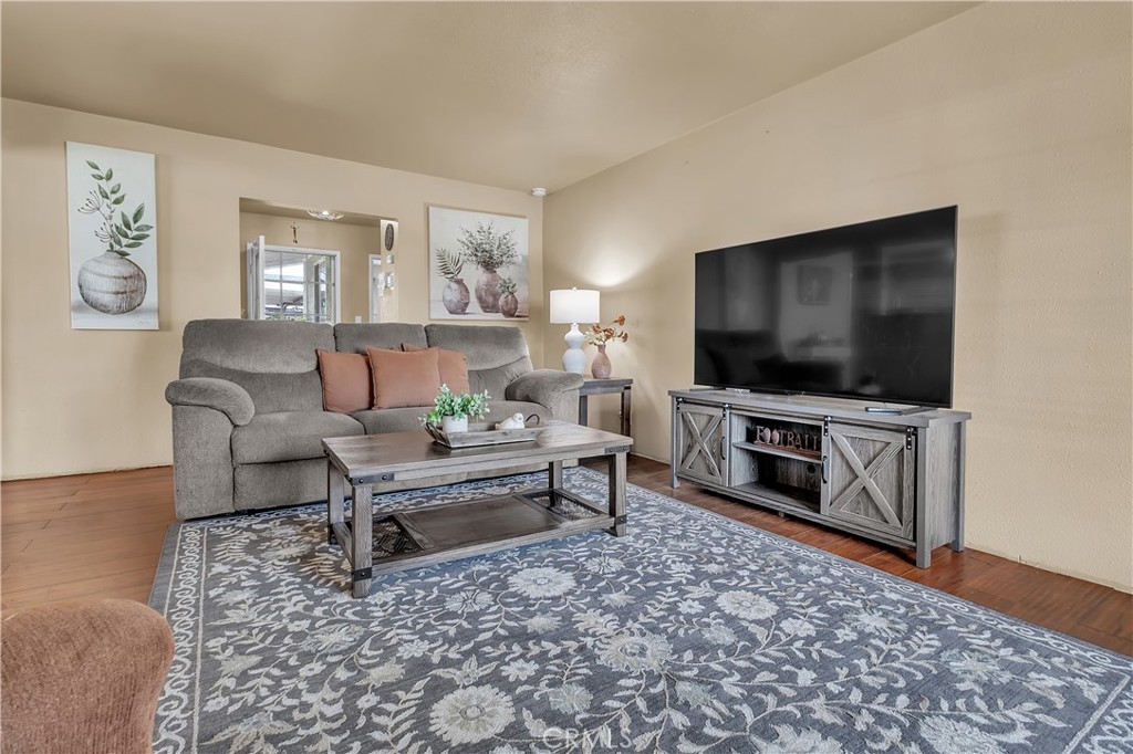 1414 West Shorb Street Alhambra, CA 91803 - Photo 7 of 33 a living room with furniture and a flat screen tv