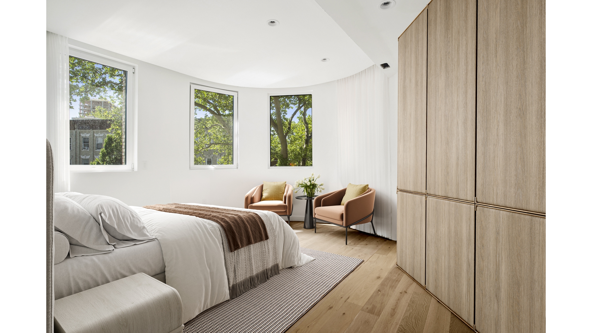 128 Woodpoint Road, Unit 2A Brooklyn, NY 11211 - Photo 7 of 15 a bedroom with a bed and wooden floor