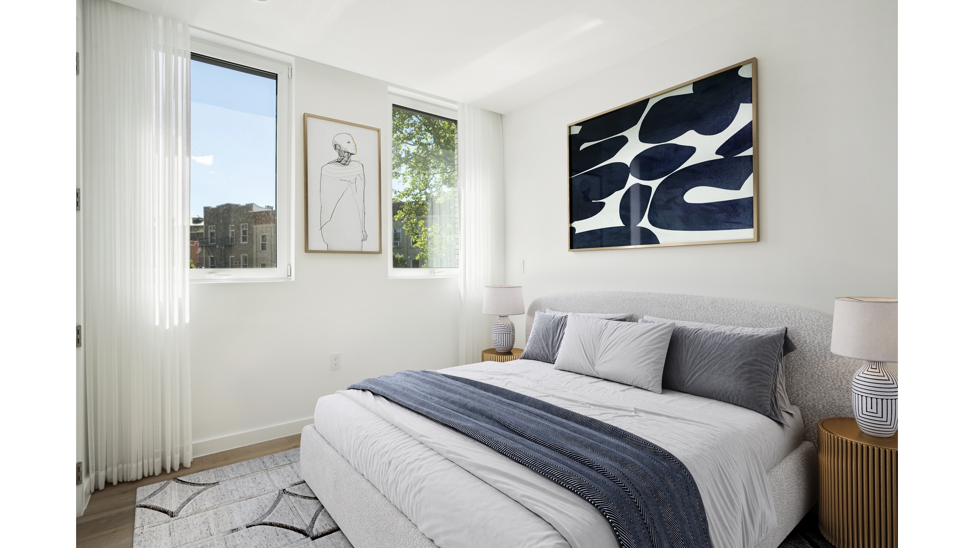 128 Woodpoint Road, Unit 2A Brooklyn, NY 11211 - Photo 9 of 15 a bedroom with a bed and a painting on the wall