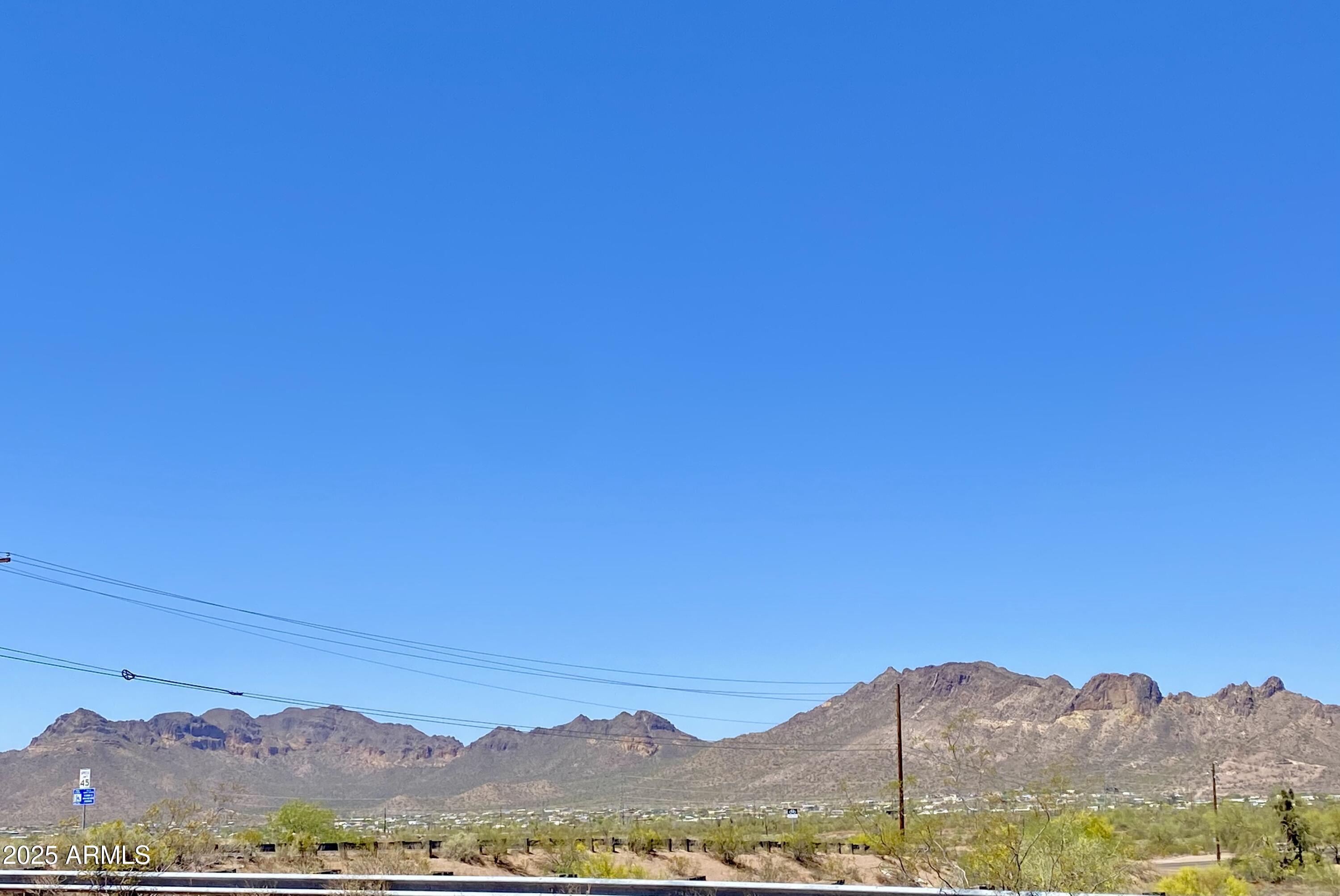 11101 East University Drive, Unit 125 Apache Junction, AZ 85120 - Photo 20 of 32 a view of a city with mountain in the background