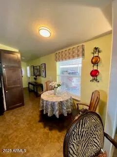 a bedroom with furniture and a bed