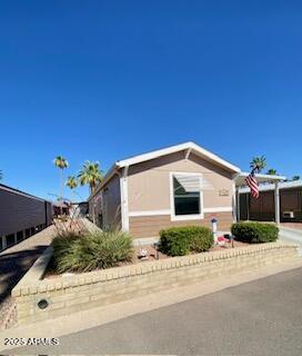 11101 East University Drive, Unit 125 Apache Junction, AZ 85120 - Photo 9 of 32 a house with a outdoor space