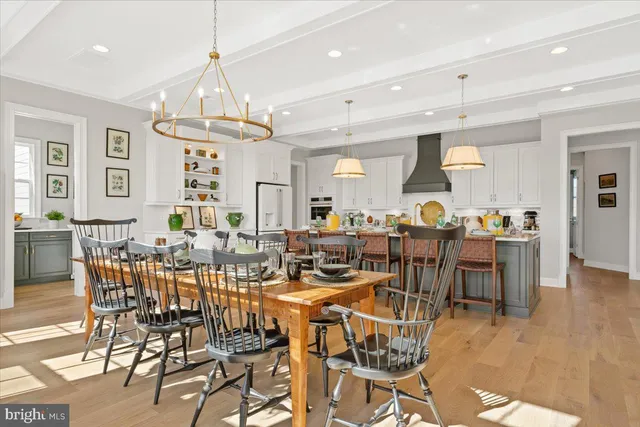 a view of a dining area with furniture window and wooden floor