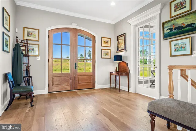 a view of a livingroom with furniture and workspace