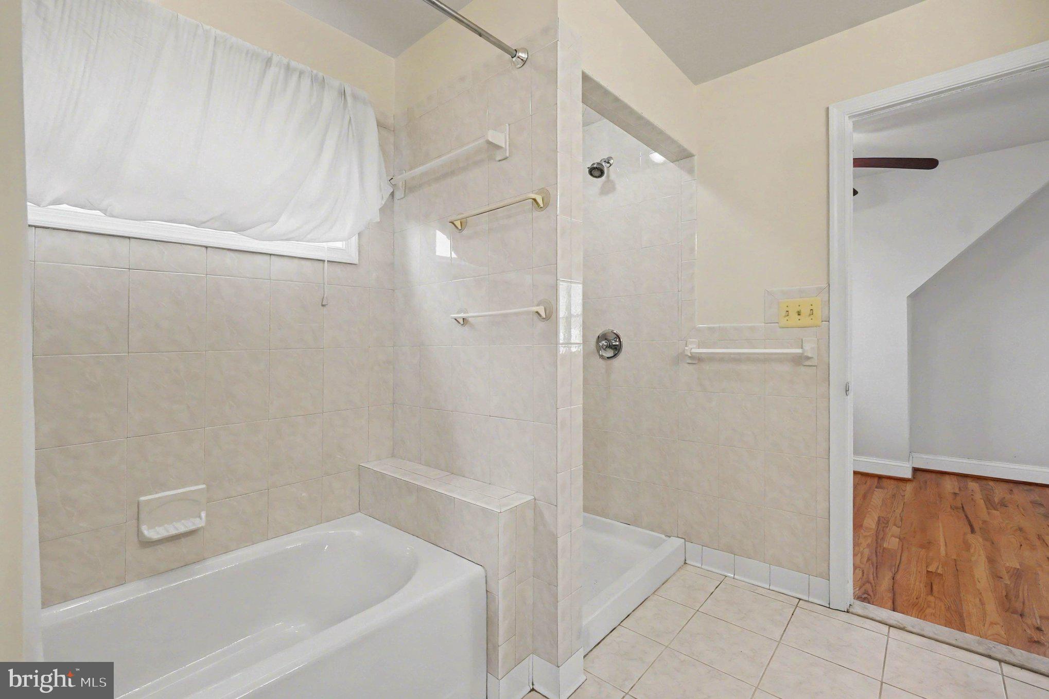 7908 Oakleigh Road Baltimore, MD 21234 - Photo 22 of 41 a bathroom with a bathtub