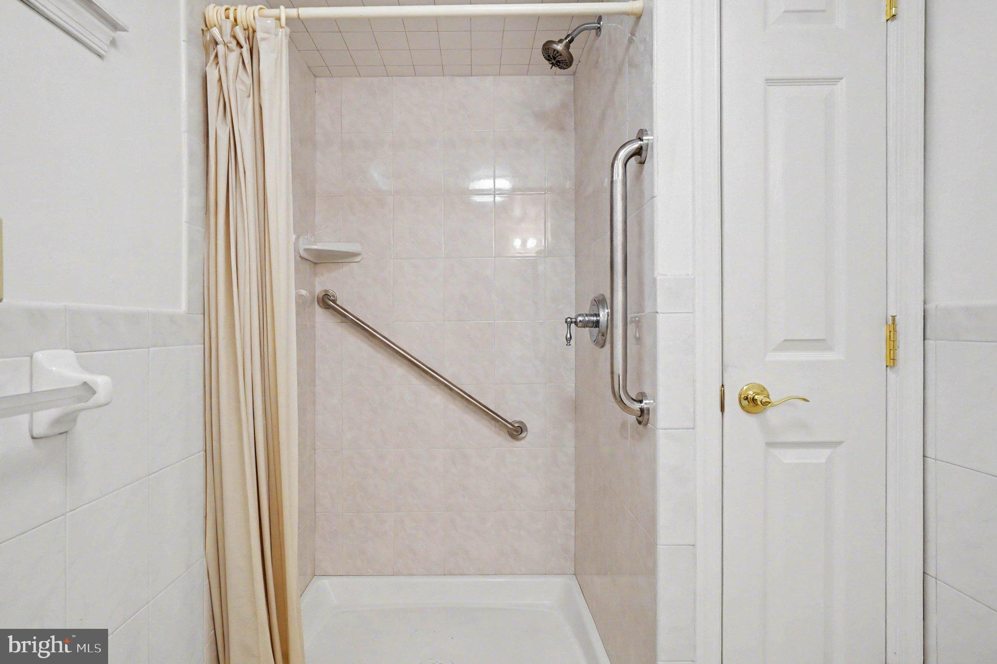 7908 Oakleigh Road Baltimore, MD 21234 - Photo 28 of 41 a bathroom with a shower