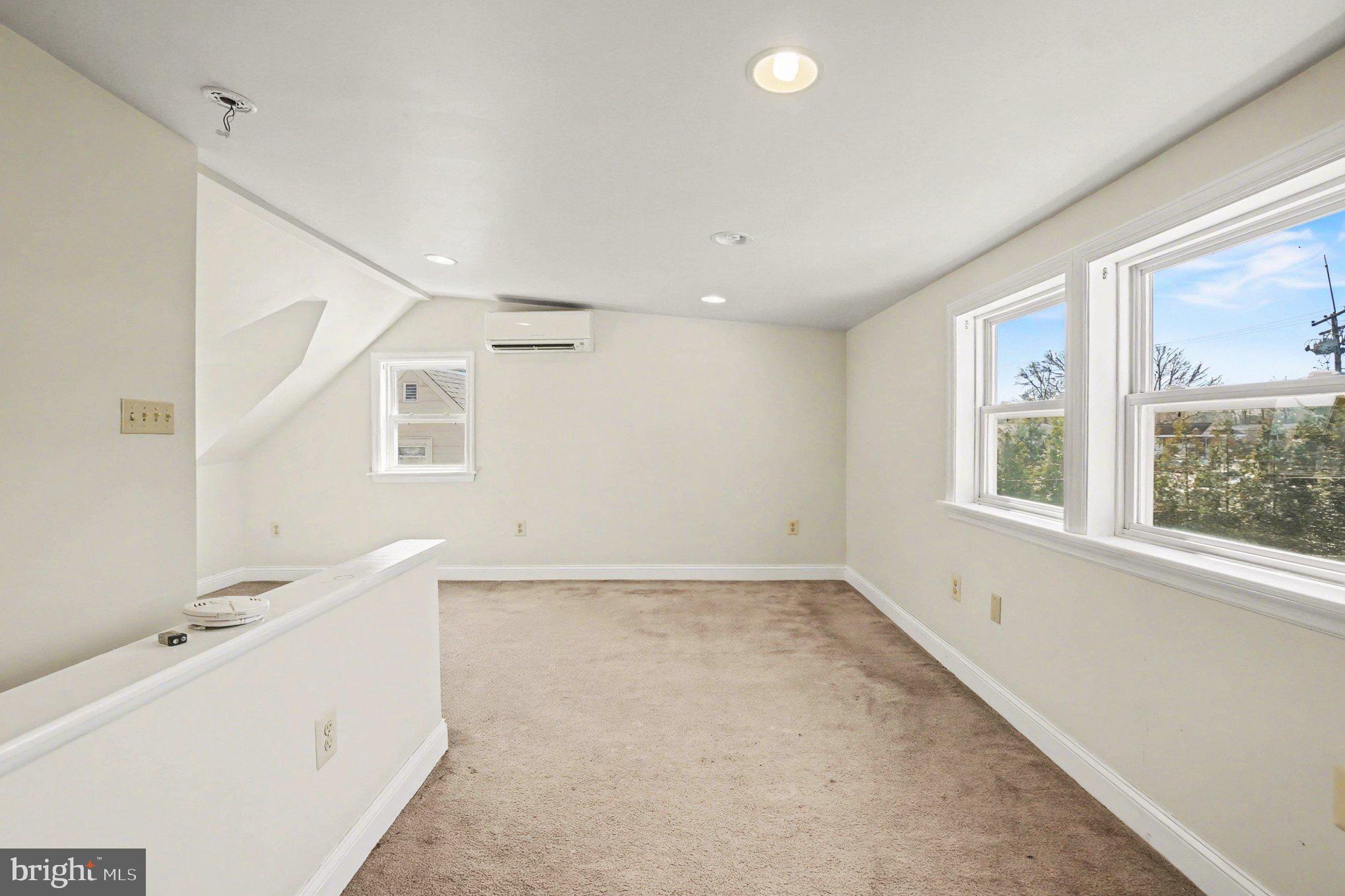 7908 Oakleigh Road Baltimore, MD 21234 - Photo 34 of 41 a view of an empty room with a window