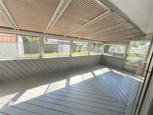 539 Ridgewood Road Elk Grove Village, IL 60007 - Photo 14 of 15 a view of an empty room with wooden floor and a window