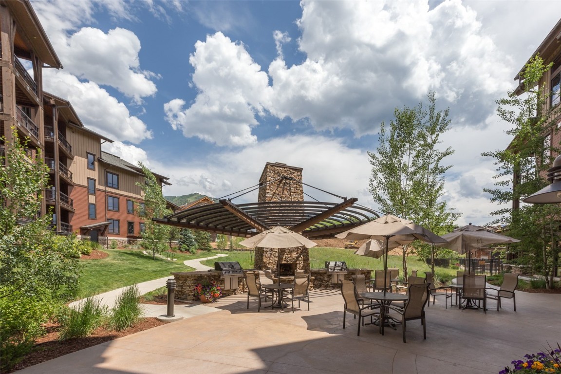 1468 Bangtail Way, Unit C Steamboat Springs, CO 80487 - Photo 45 of 50 Outdoor fireplace, grills, seating at Wildhorse Amenities