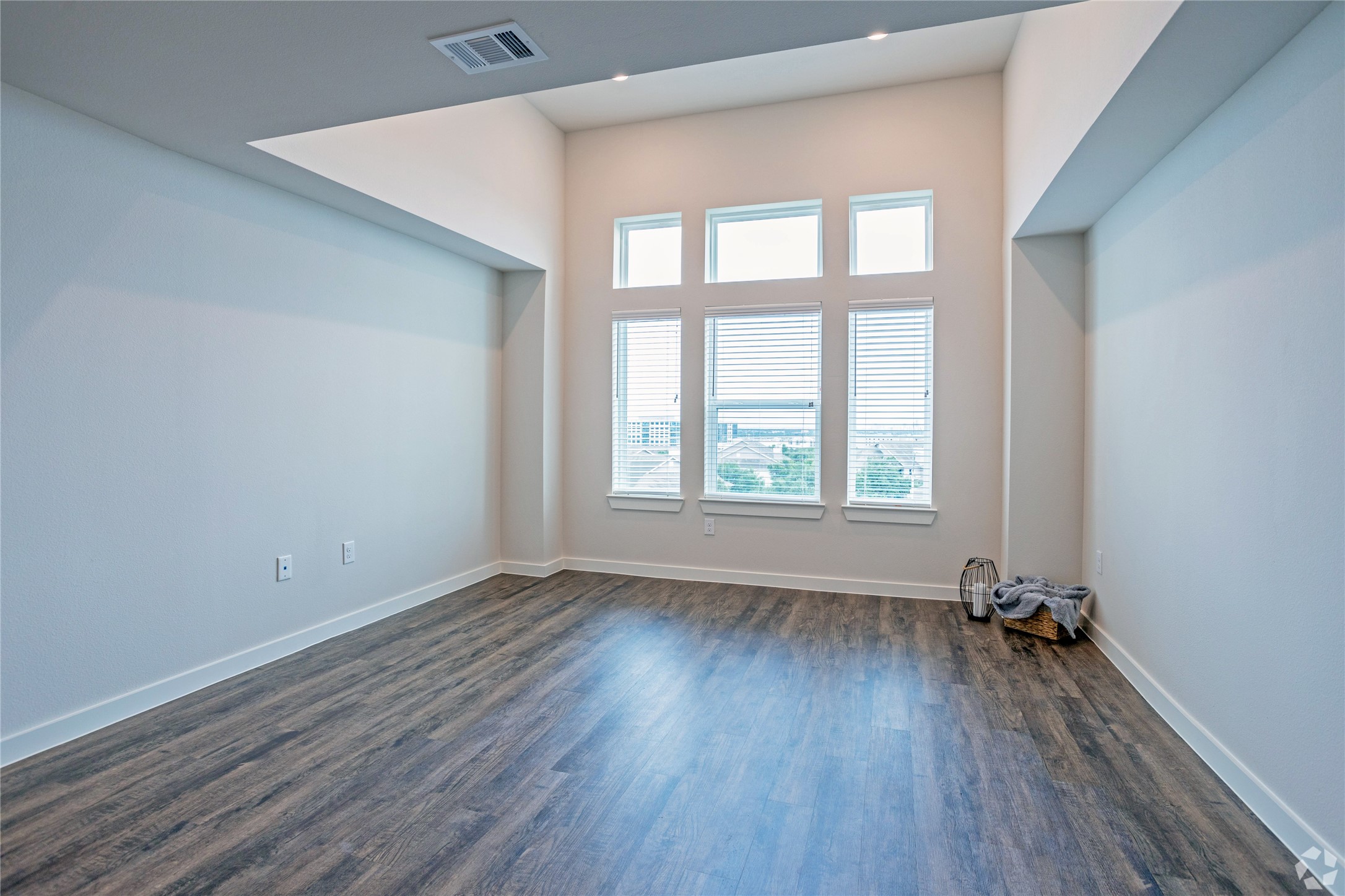 10010 North Capital Of Texas Highway, Unit 116 Austin, TX 78759 - Photo 11 of 20 an empty room with a hardwood floor and a window