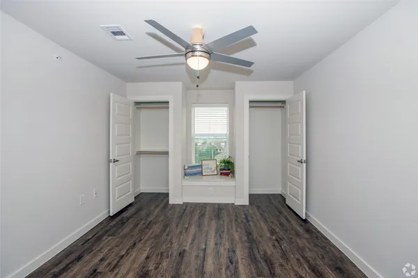 a view of an empty room and window