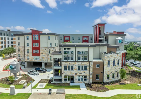 a view of pool with outdoor seating