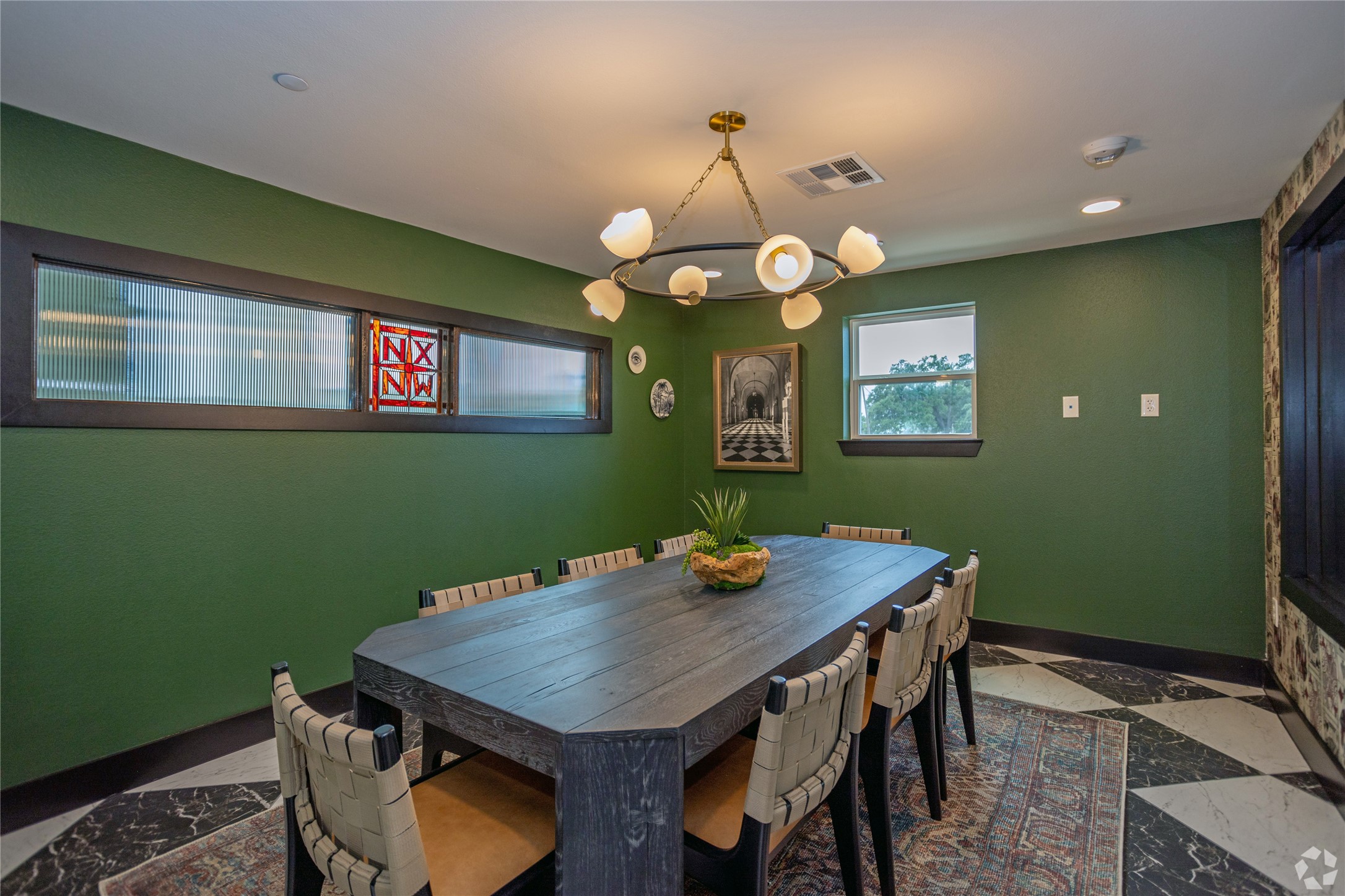 10010 North Capital Of Texas Highway, Unit 116 Austin, TX 78759 - Photo 9 of 20 a view of a dining room with furniture and chandelier