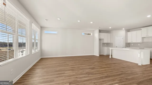 a view of a kitchen with electric appliances
