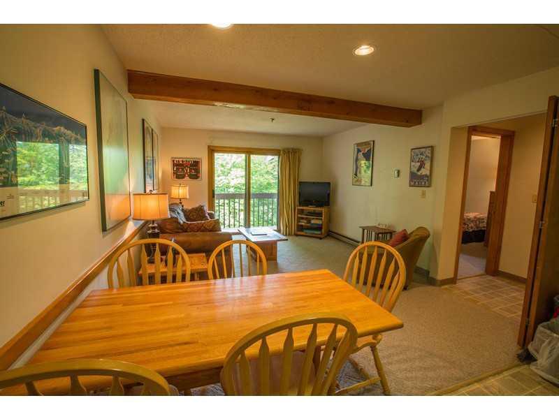 8 Moonstruck Drive, Unit B112 Newry, ME 04261 - Photo 6 of 15 Dining Room. Dining area and living...