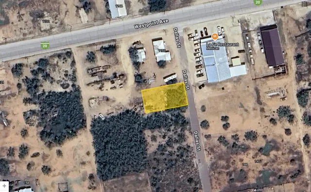 a bathroom with a shower curtain and a large window