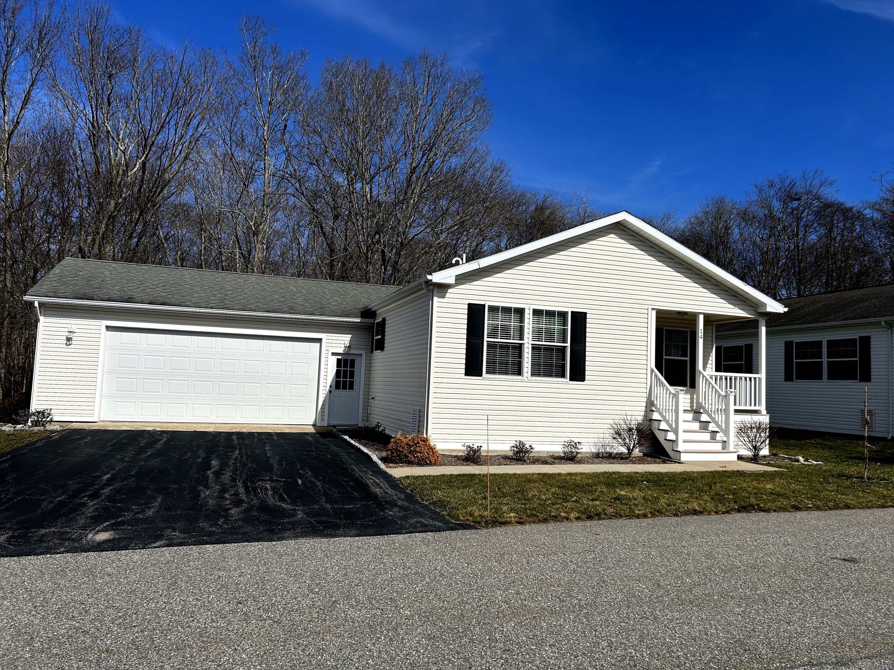 14 Cliff Road Ledyard, CT 06339 - Photo 1 of 1 a front view of a house with a yard