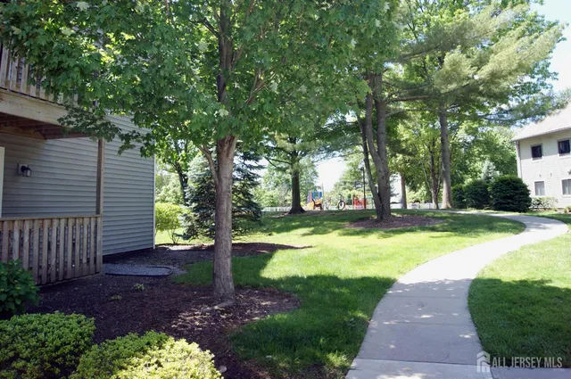 a view of backyard with green space