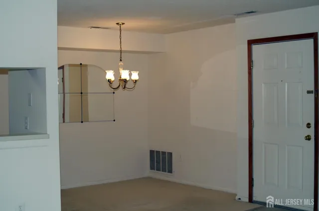 a view of a room with a fan