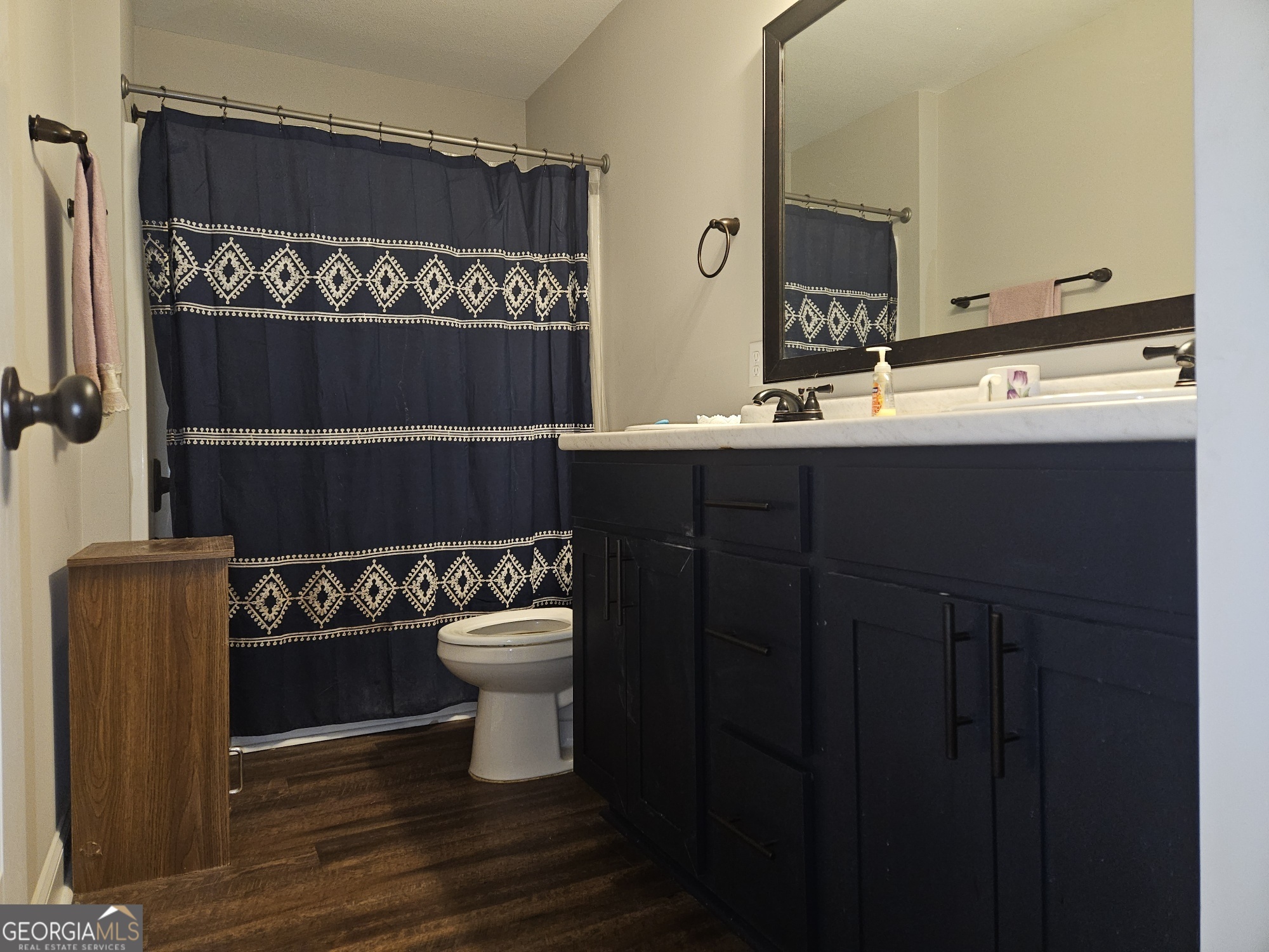 101 Old Barn Road Statesboro, GA 30458 - Photo 12 of 16 a bathroom with a sink and a mirror