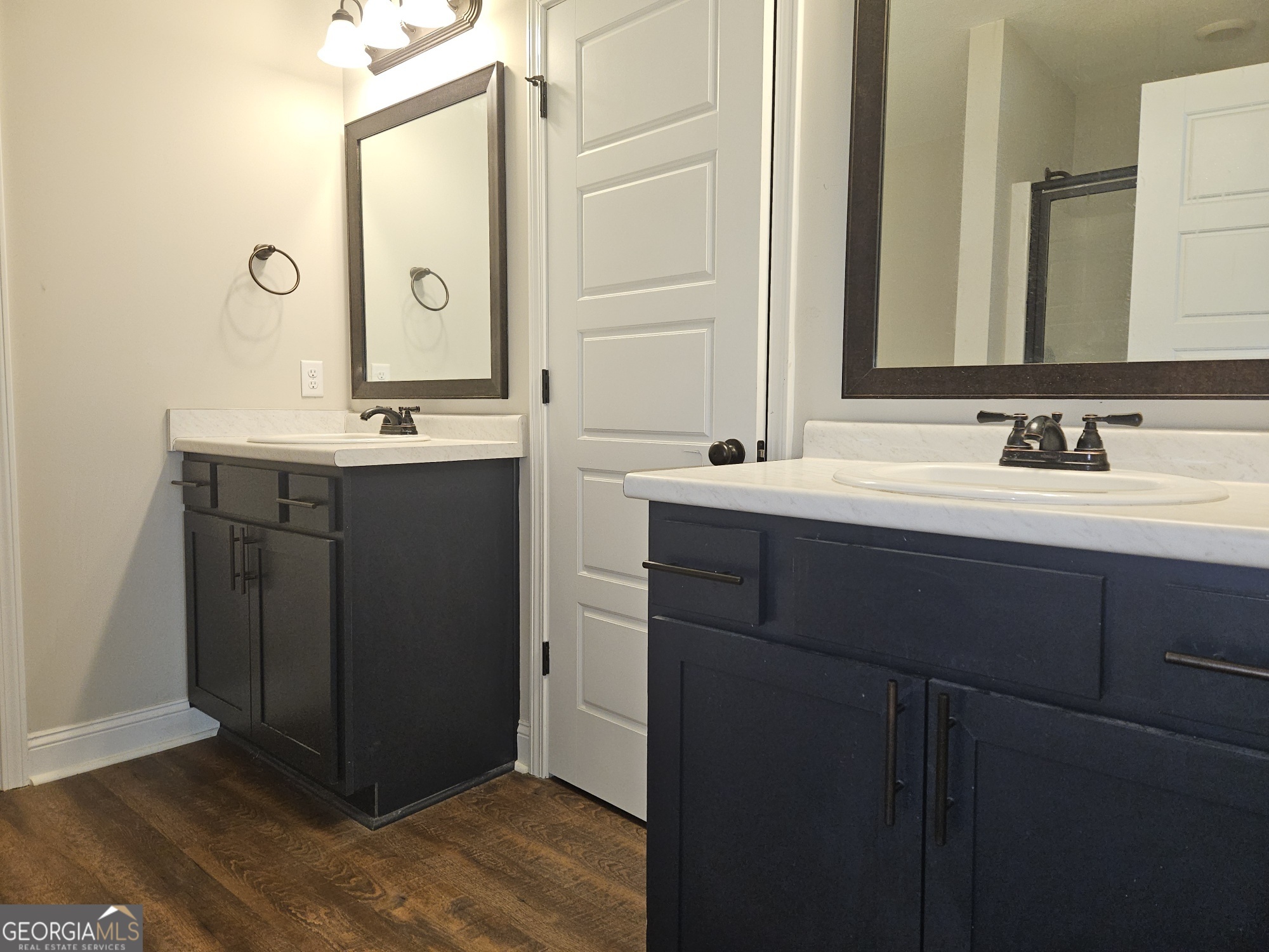 101 Old Barn Road Statesboro, GA 30458 - Photo 7 of 16 a bathroom with a double vanity sink and a mirror
